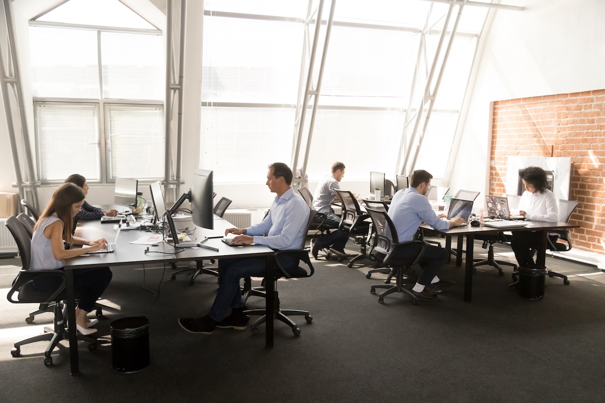 Nearshore Center of Excellence team working in Mexico office